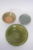 Group of Chinese pottery items including a small Song dynasty green dish (repairs), further