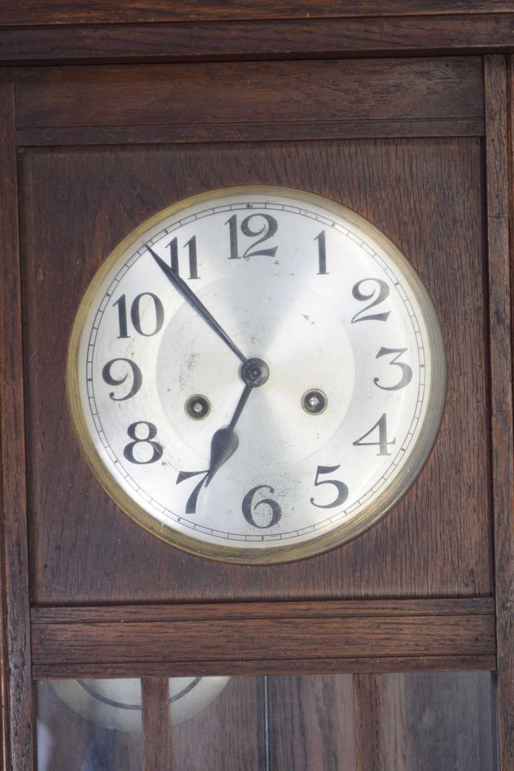 Early 20th century wall clock in oak case with silvered dial, Arabic numerals, twin train - Image 2 of 2