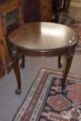 Small Edwardian circular centre or dining table raised on cabriole legs with shell carved knees