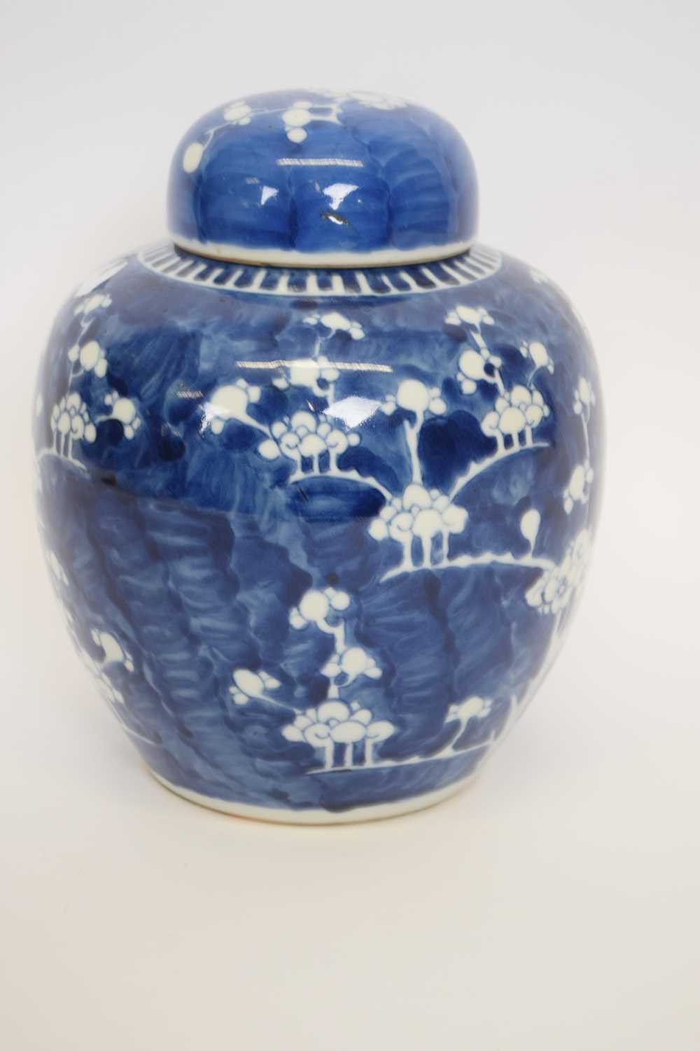 Chinese porcelain jar and cover with prunus decoration on a blue ground - Image 3 of 6