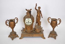 Late 19th century Continental bronzed spelter clock garniture, comprising a clock with figural