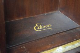 Edison Amberola wooden cased table top phonograph together with a quantity of phonograph reels