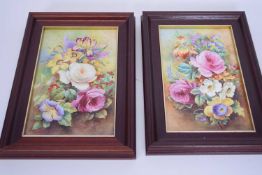 Pair of framed porcelain plaques painted with floral sprays, possibly by A Holland, Wedgwood and