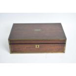 19th century rosewood and brass bound writing slope of hinged form with fitted interior, 40cm wide