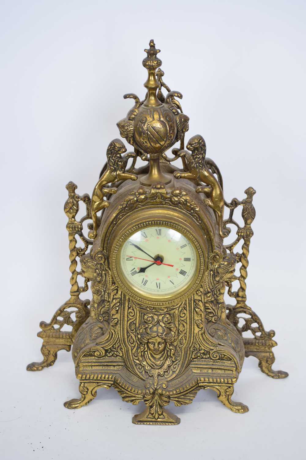 20th century Continental brass cased mantel clock set with a quartz movement, 46cm high