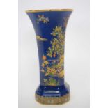 Carlton ware blue Royale faceted shaped vase with polychrome gilt design of a pagoda, 20cm high