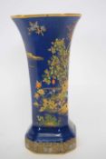 Carlton ware blue Royale faceted shaped vase with polychrome gilt design of a pagoda, 20cm high