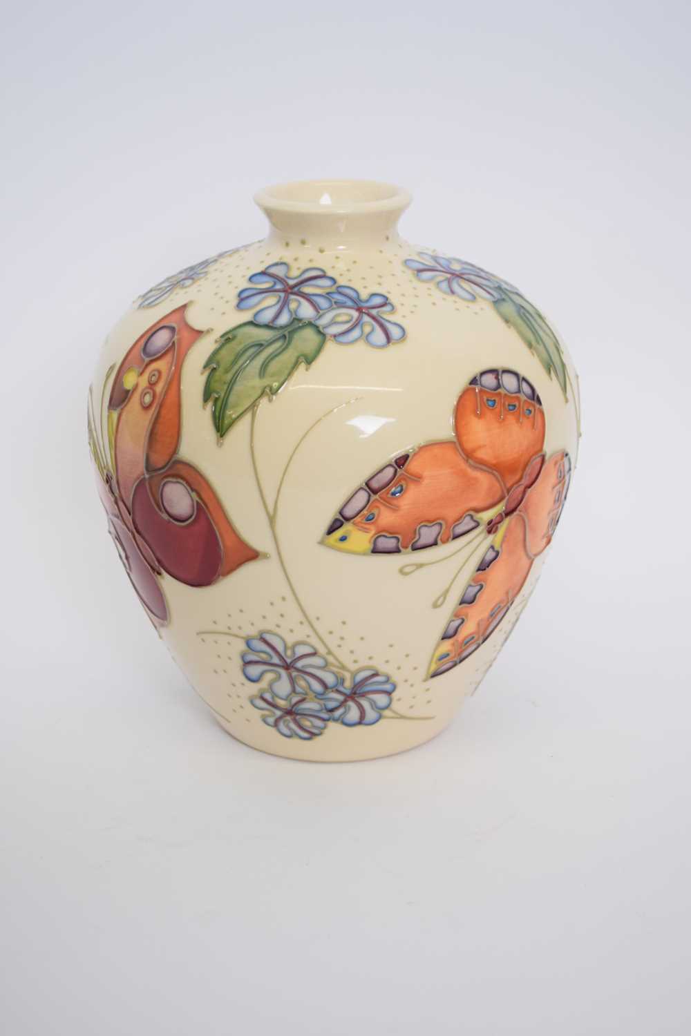 Moorcroft vase with tube lined design of butterflies on a pale beige ground - Image 3 of 6