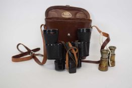 Pair of binoculars made by Ross, London in leather case, together with a small pair of opera glasses