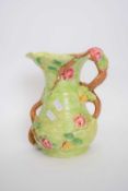 James Kent Art Deco style jug with green ground with branch and floral decoration