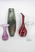 Group of four Art glass wares including a ewer with streaked white decoration on ruby ground, tall