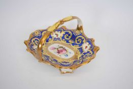 Small 19th century English porcelain basket, pattern no 2/189, decorated with a central spray of