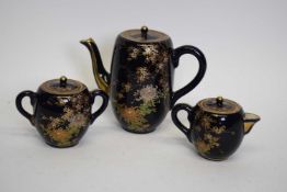 20th century Japanese Satsuma three piece tea service decorated with chrysanthemums and blossom on a