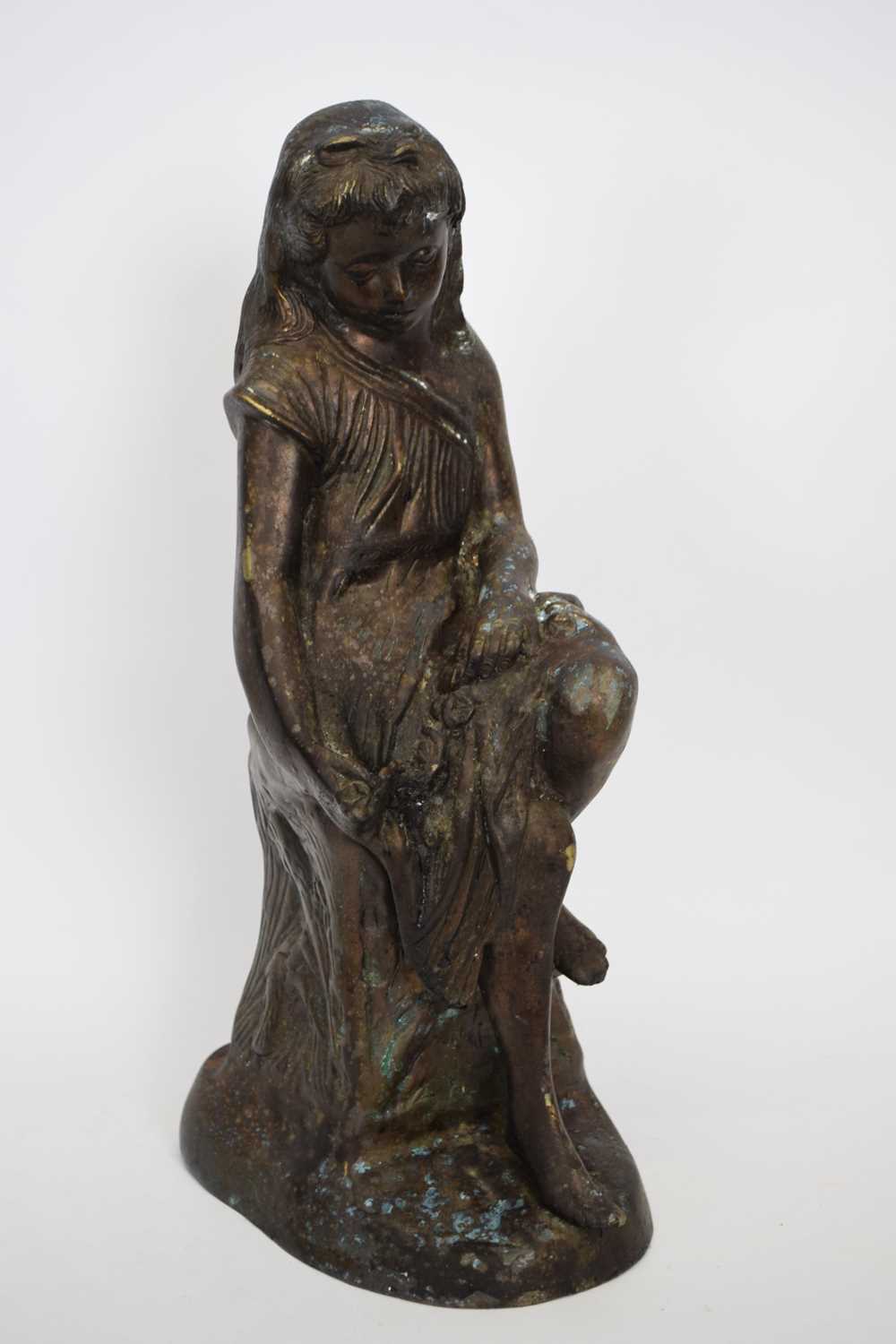 20th century hollow bronzed metal figure of a seated girl, 43cm high