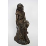 20th century hollow bronzed metal figure of a seated girl, 43cm high