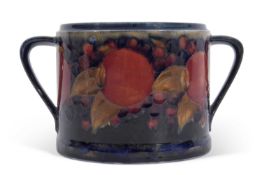 Early 20th century Moorcroft pomegranate box with loop handles (cover lacking)