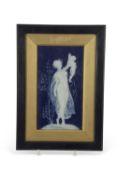 Framed pate-sur-pate plaque, signed by L Solon, of a maiden holding a cherub aloft, in black and