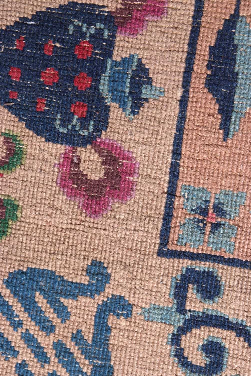 Early 20th century Peking wool carpet decorated with stylised foliage on a blue centre with a pale - Image 10 of 11