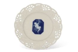 19th century Minton plate, the centre with a shaped panel with pate-sur-pate decoration of a cherub,