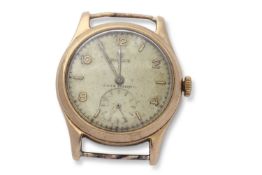 Mid-20th century 9ct gold cased Rolex wrist watch having gilt metal numerals and baton indicators,