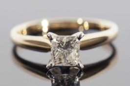 Diamond solitaire ring, the Princess cut diamond weighing approx 1ct, raised in a four prong