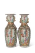 Pair of 19th century Cantonese vases, decorated in typical fashion with alternating panels of