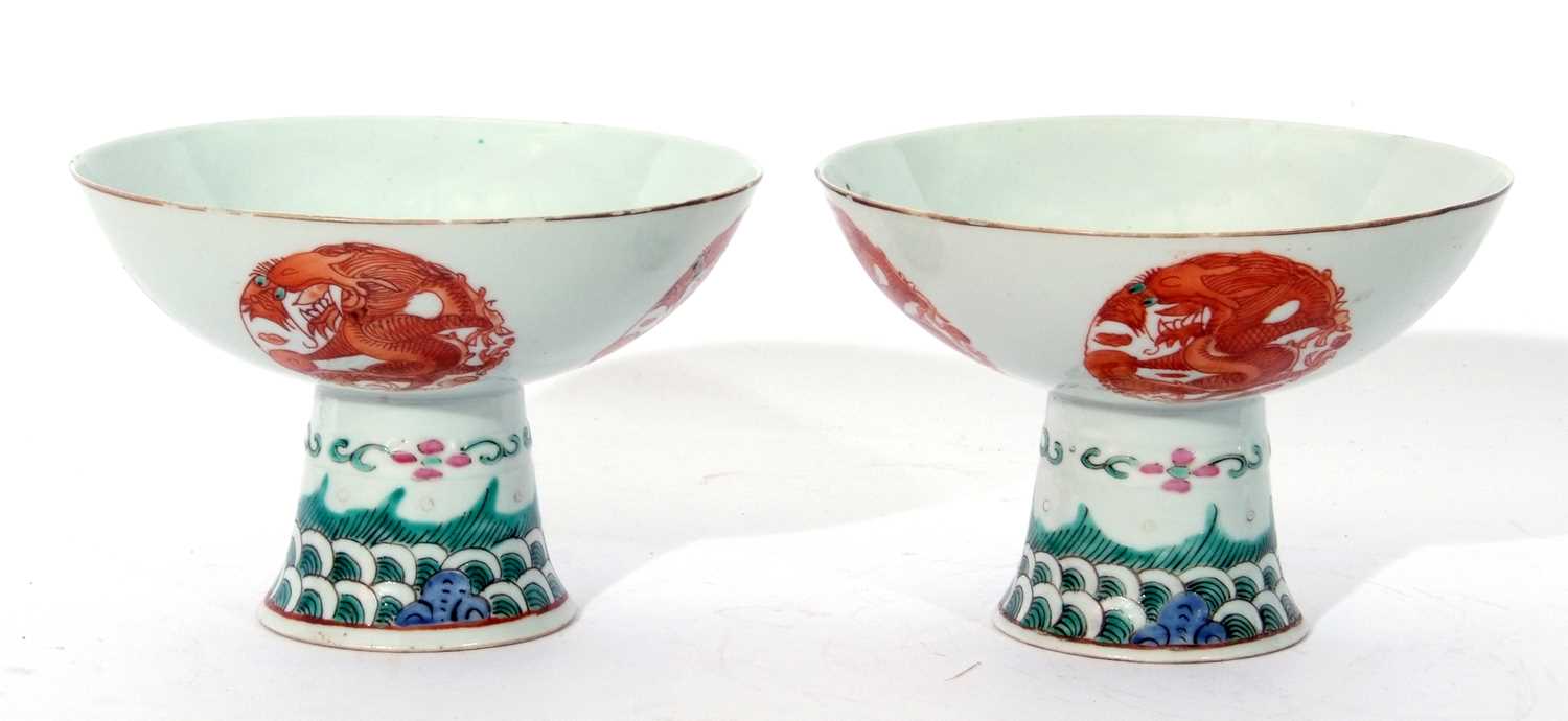 Pair of Chinese porcelain stem cups, late Qing dynasty, decorated in iron red with phoenix to the - Image 8 of 8