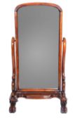 A Victorian Mahogany framed cheval mirror on scrolled supports