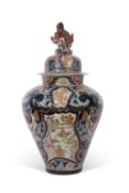 Large Japanese Arita jar and cover, early 19th century, decorated in iron red and gilt designs on