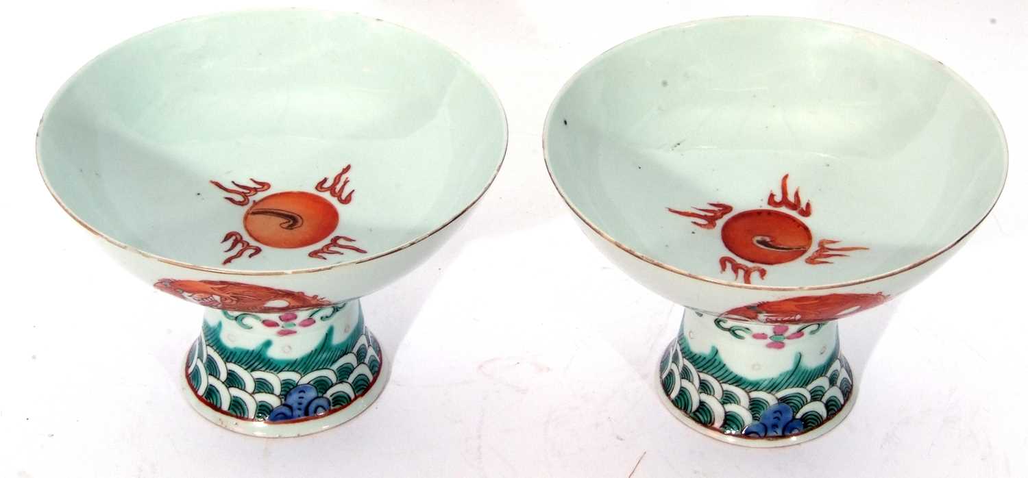 Pair of Chinese porcelain stem cups, late Qing dynasty, decorated in iron red with phoenix to the - Image 3 of 8