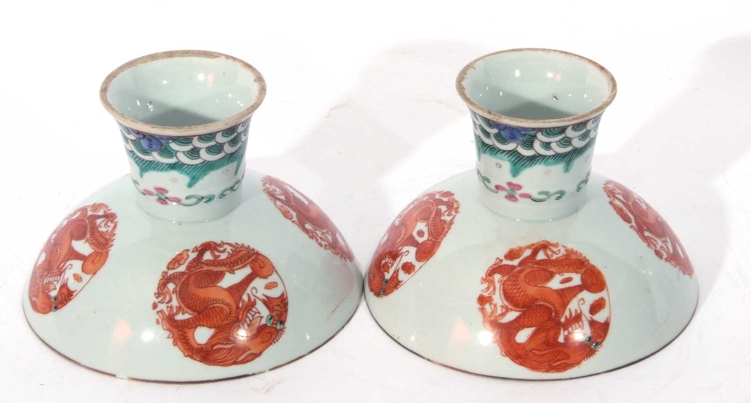 Pair of Chinese porcelain stem cups, late Qing dynasty, decorated in iron red with phoenix to the - Image 6 of 8