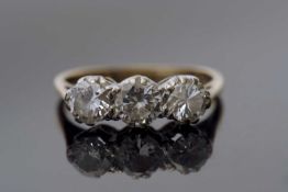 Three stone diamond ring set with three graduated round brilliant cut diamonds, 0.75ct approx,