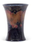 Early 20th century Moorcroft small vase with leaf and berry design, 9cm high