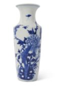 Chinese porcelain vase of cylindrical form decorated in bright blue enamels with foliage, 20cm high