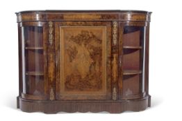 Victorian burr walnut veneered credenza of typical form with panelled centre door and two bowed side