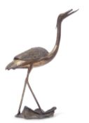Japanese bronze crane, Meiji period, the long legged bird standing on a lily pad with feather top