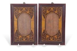 A pair of late 19th century small picture frames, the frames with oval apertures surrounded by an