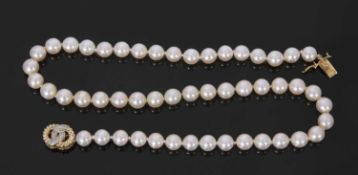 Single row of cultured pearls of uniform size, 7.8mm diam approx, to an 18ct gold and diamond set
