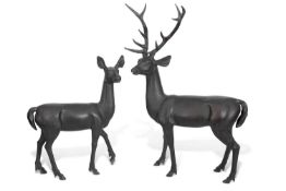 Pair of contemporary bronzed metal models of a stag and hind, largest 145cm high (2)