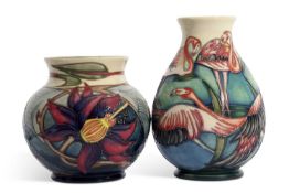 Modern Moorcroft vase of ovoid shape, tube lined decoration of flamingoes, together with a further