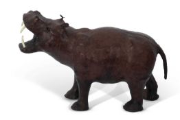An unusual leather covered antique model of a hippopotamus, of naturalistic form, approx 43cm long