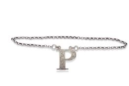 Victorian wine label in the form of the letter 'P', foliate engraved, complete with hanging chain,