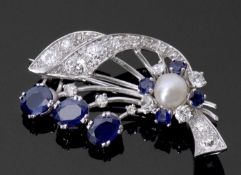 Diamond, sapphire and pearl brooch, the spray designed frame displays a feature 8mm cultured pearl