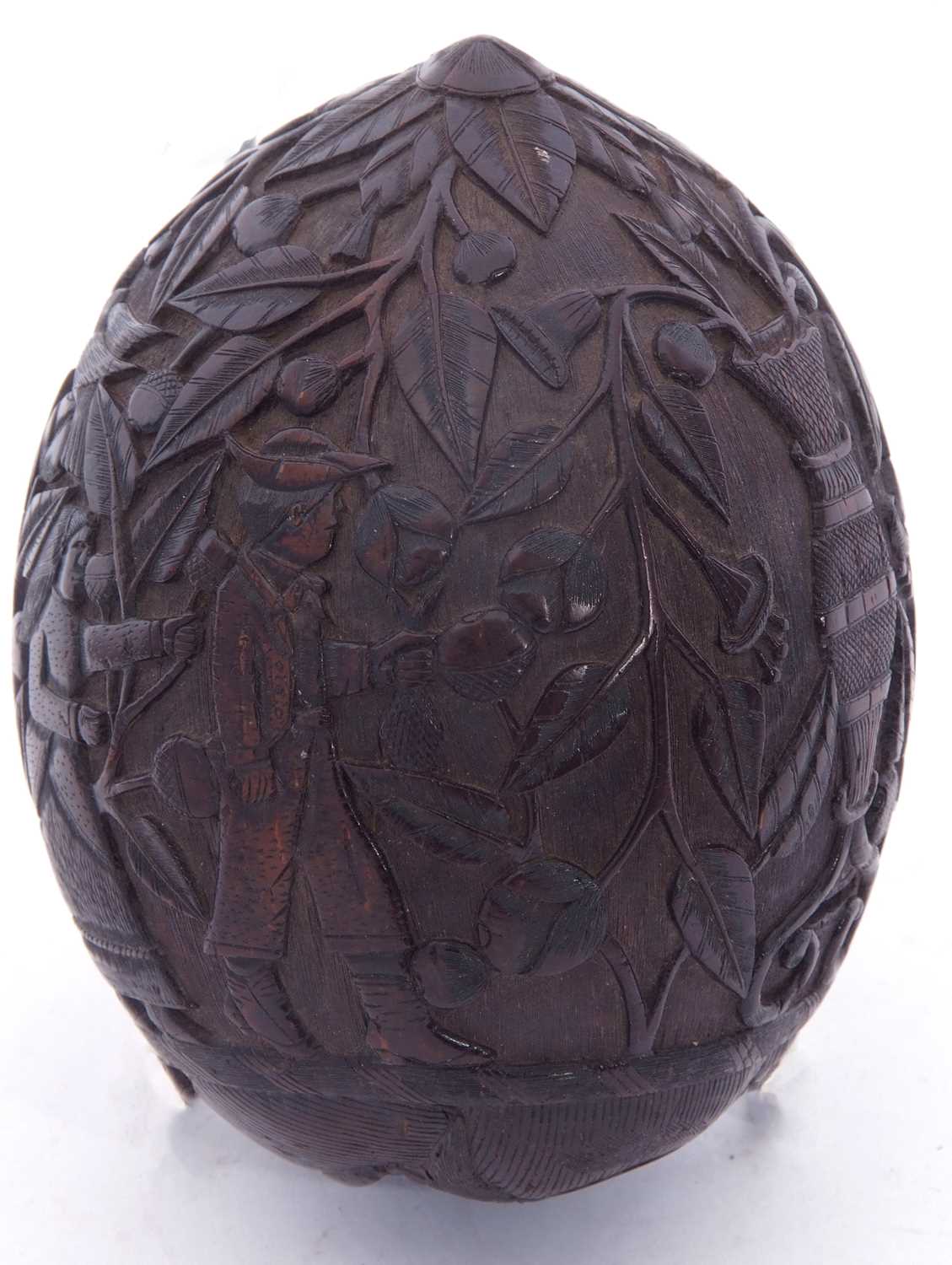 An unusual antique carved coconut bugbear container, the exterior decorated with a scene of - Image 4 of 5