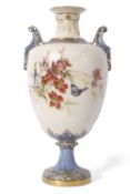Large Royal Worcester vase decorated with flowers and butterflies by Edward Raby, above a blue and