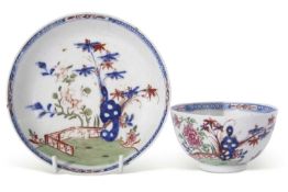 Lowestoft porcelain tea bowl and saucer, circa 1780, with a Redgrave type design of flowers and a