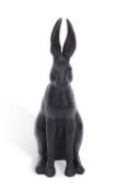 A contemporary bronzed metal model of a seated hare, 62cm high