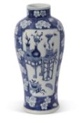 19th century Chinese porcelain baluster vase with prunus decoration on a washed blue ground with two