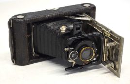 AN EARLY HOUGHTON ENSIGN QUARTER PLATE FOLDING CAMERA