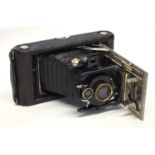 AN EARLY HOUGHTON ENSIGN QUARTER PLATE FOLDING CAMERA